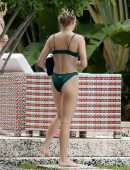 Sophie Turner in Bikini with Dog in Miami