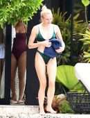 Sophie Turner in Bikini with Dog in Miami