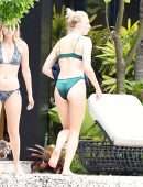 Sophie Turner in Bikini with Dog in Miami