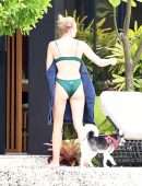 Sophie Turner in Bikini with Dog in Miami