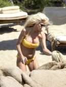 Victoria Silvstedt in Yellow Bikini at a Beach in Sardinia