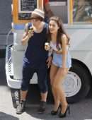 Ariana Grande Leggy in Denim Shorts on a Music Video Set