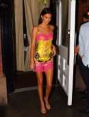 Kendall Jenner slips into a Versace dress for dinner with friends during NYFW