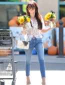 Sarah Hyland Carries a Bouquet of Halloween Sunflowers in Los Angeles