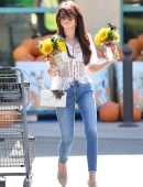 Sarah Hyland Carries a Bouquet of Halloween Sunflowers in Los Angeles