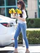 Sarah Hyland Carries a Bouquet of Halloween Sunflowers in Los Angeles