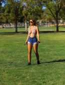Ana Braga in Shorts showing Boobs at the Park in Los Angeles
