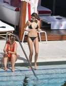 Kaia Gerber in Black Bikini at a Pool in Miami