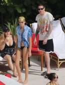 Kaia Gerber in Black Bikini at a Pool in Miami