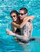 Kaia Gerber in Black Bikini at a Pool in Miami