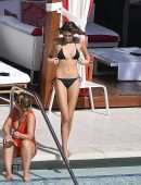 Kaia Gerber in Black Bikini at a Pool in Miami