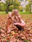 Kimberley Garner Walking her Dog in a White Swimsuit in London's Hyde Park
