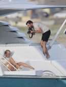 Pamela Anderson in White Swimsuit for a Photoshoot on the Gold Coast