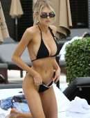 Charlotte Mckinney in Black Bikini Soaks up some Sun in Miami