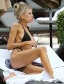 Charlotte Mckinney in Black Bikini Soaks up some Sun in Miami