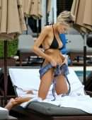 Charlotte Mckinney in Black Bikini Soaks up some Sun in Miami