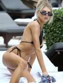 Charlotte Mckinney in Black Bikini Soaks up some Sun in Miami