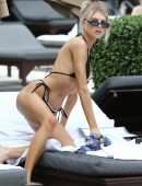 Charlotte Mckinney in Black Bikini Soaks up some Sun in Miami