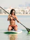 Danielle Lloyd in Bikini, Paddle Boarding at the Beach in Dubai