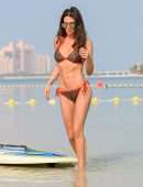 Danielle Lloyd in Bikini, Paddle Boarding at the Beach in Dubai