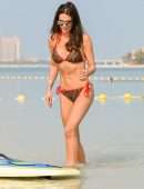 Danielle Lloyd in Bikini, Paddle Boarding at the Beach in Dubai