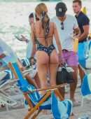 Kimberley Garner Booty in a Blue Floral One-piece on the Beach in Miami