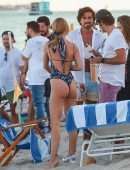 Kimberley Garner Booty in a Blue Floral One-piece on the Beach in Miami