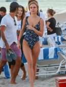 Kimberley Garner Booty in a Blue Floral One-piece on the Beach in Miami