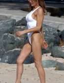 Lizzie Cundy in White Swimsuit on the Beach in Barbados