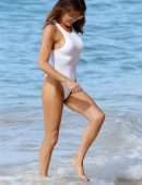Lizzie Cundy in White Swimsuit on the Beach in Barbados