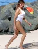 Lizzie Cundy in White Swimsuit on the Beach in Barbados
