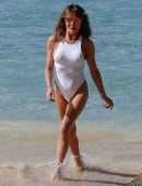 Lizzie Cundy in White Swimsuit on the Beach in Barbados