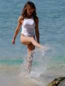 Lizzie Cundy in White Swimsuit on the Beach in Barbados