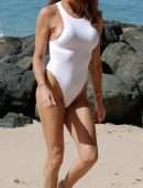 Lizzie Cundy in White Swimsuit on the Beach in Barbados