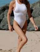 Lizzie Cundy in White Swimsuit on the Beach in Barbados