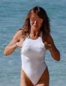 Lizzie Cundy in White Swimsuit on the Beach in Barbados