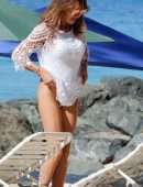 Lizzie Cundy in White Swimsuit on the Beach in Barbados