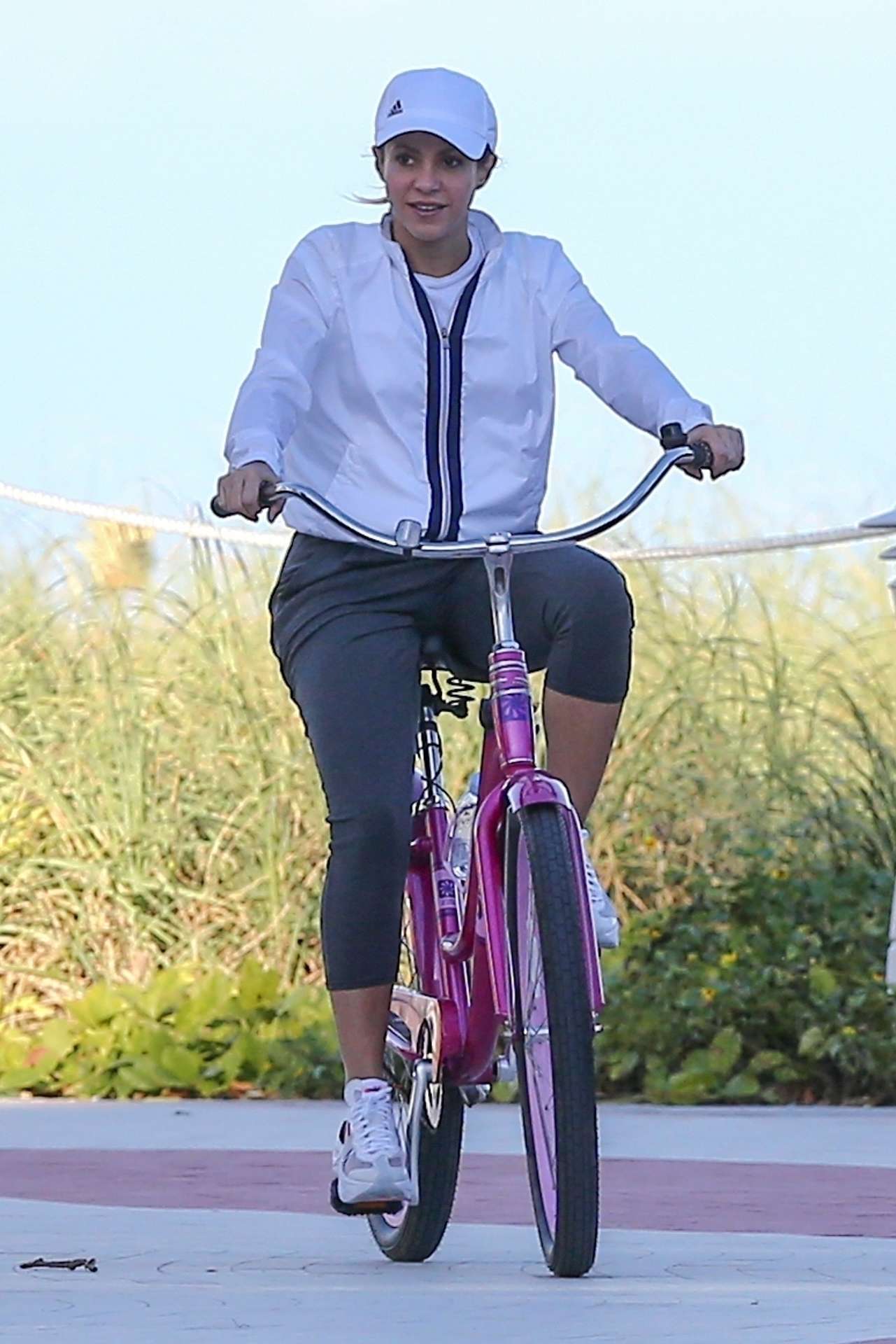 Shakira Riding a Bike at the Beach in Miami