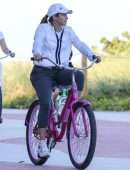 Shakira Riding a Bike at the Beach in Miami