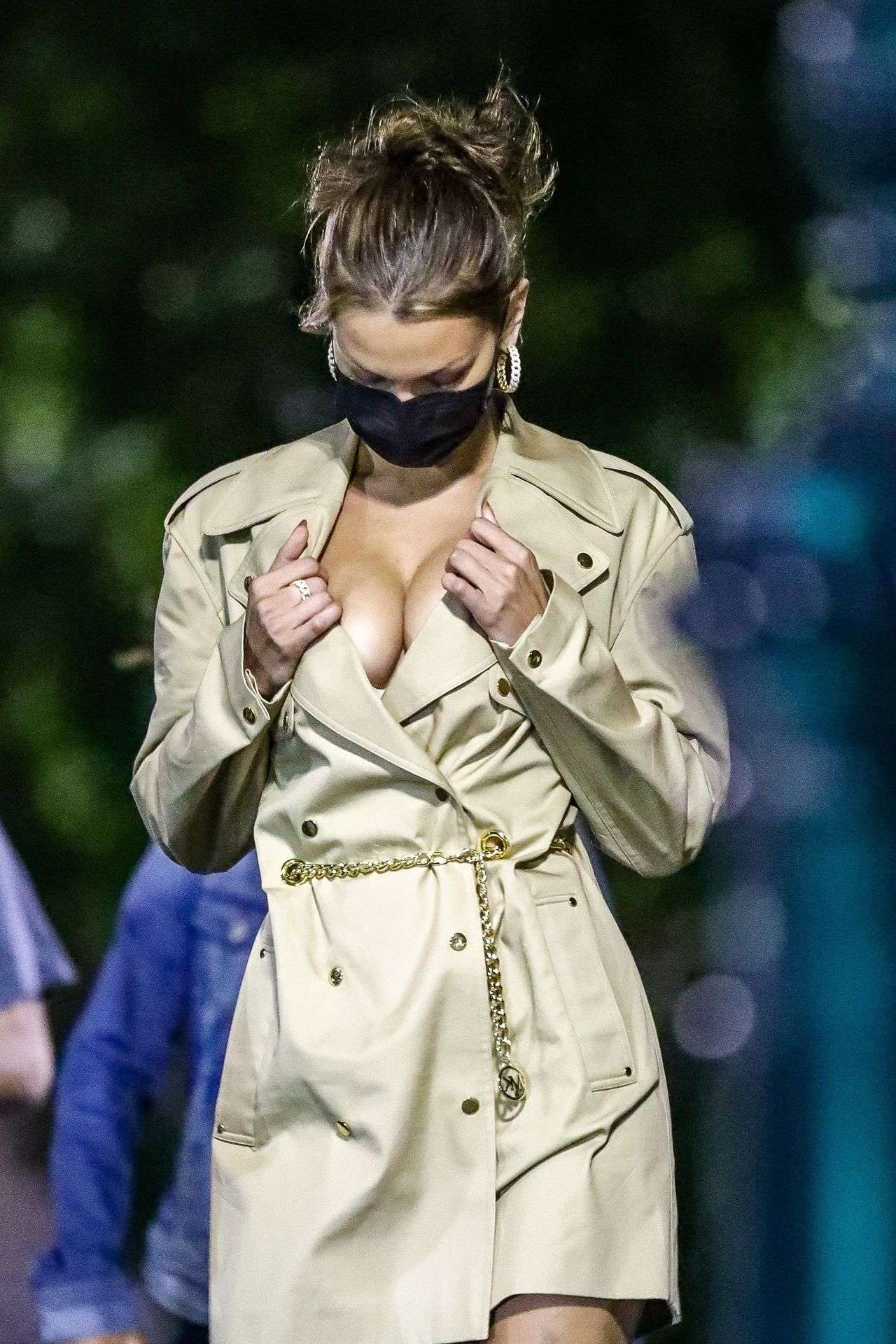 Bella Hadid Cleavage while wearing a Michael Kors Trench Coat Dress in New York