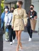 Bella Hadid Cleavage while wearing a Michael Kors Trench Coat Dress in New York