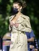 Bella Hadid Cleavage while wearing a Michael Kors Trench Coat Dress in New York