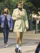 Bella Hadid Cleavage while wearing a Michael Kors Trench Coat Dress in New York