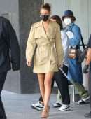 Bella Hadid Cleavage while wearing a Michael Kors Trench Coat Dress in New York