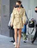 Bella Hadid Cleavage while wearing a Michael Kors Trench Coat Dress in New York