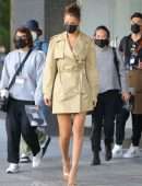 Bella Hadid Cleavage while wearing a Michael Kors Trench Coat Dress in New York