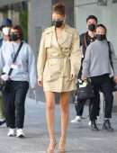 Bella Hadid Cleavage while wearing a Michael Kors Trench Coat Dress in New York