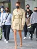 Bella Hadid Cleavage while wearing a Michael Kors Trench Coat Dress in New York