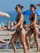 Camila Coelho Booty in a Black and Green Bikini at the Beach
