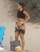 Camila Coelho Booty in a Black and Green Bikini at the Beach